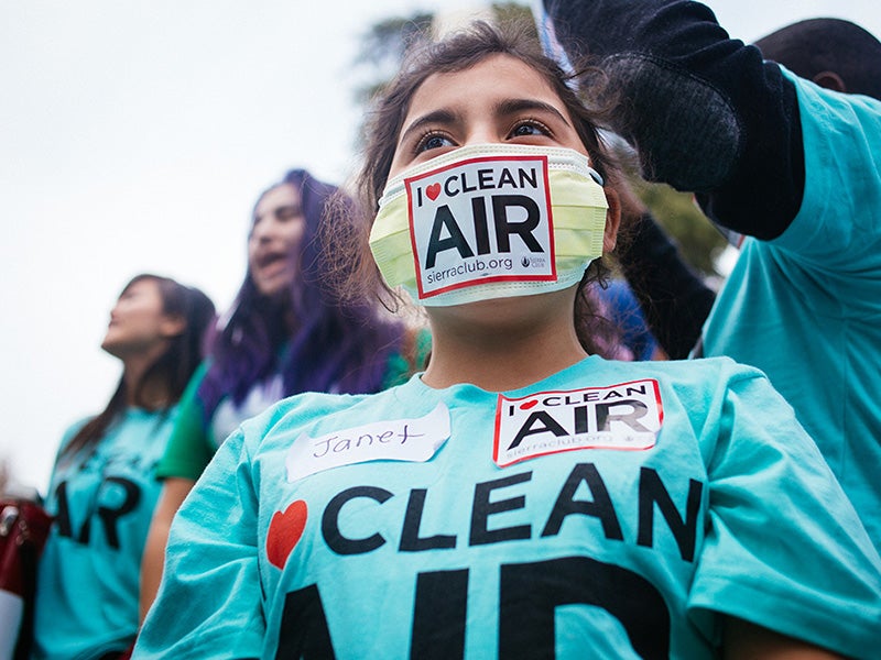 Janet Rodriguez, a fifth grader from Oakland, Calif., wears a mask adorned with an "I Love Clean Air" logo at a rally outside of the EPA Ozone hearing in Sacramento on Feb. 2, 2015. Rodriguez was one of many youth who attended the event to advocate for clean air.
(Chris Jordan-Bloch / Earthjustice)