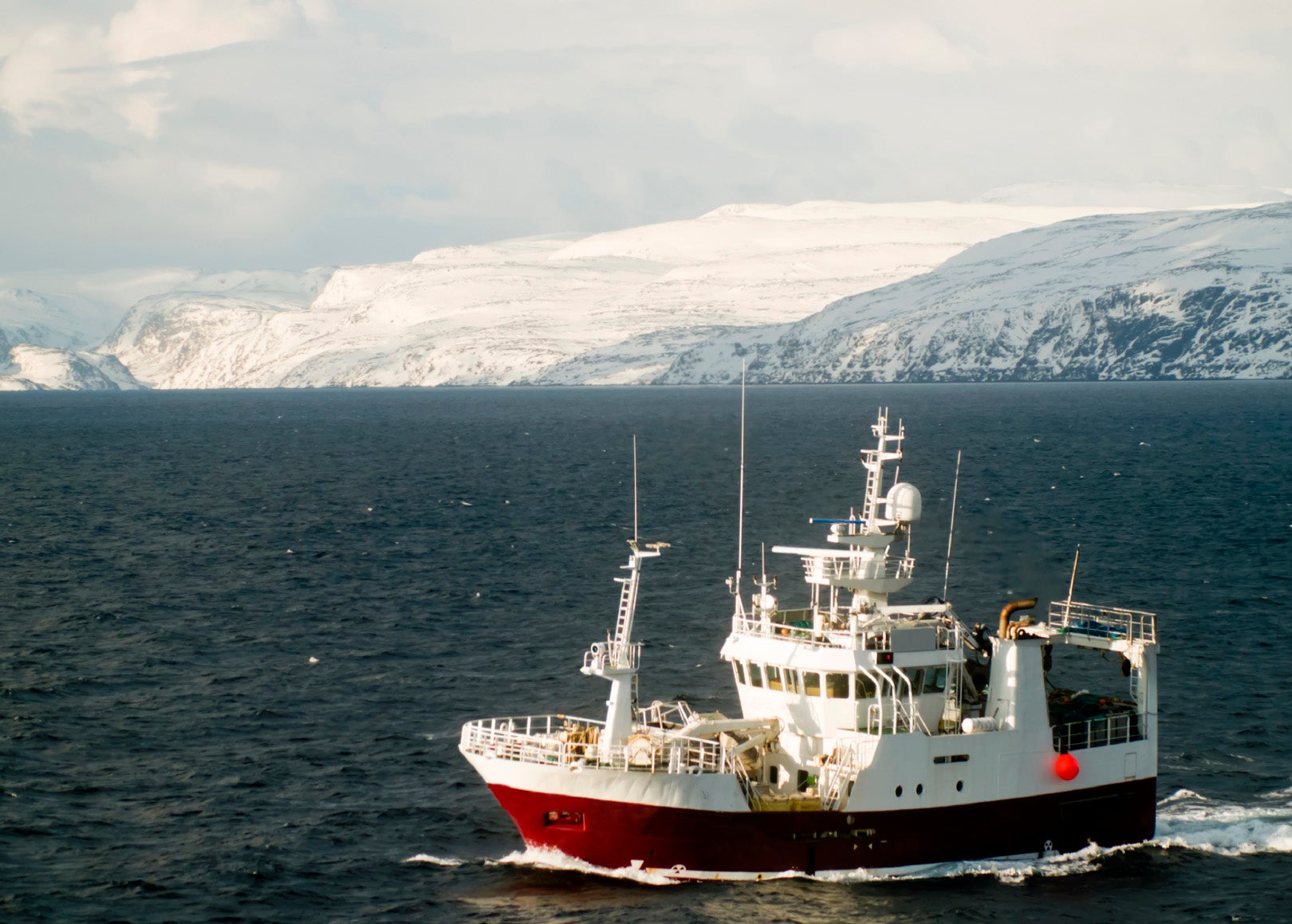 A fishing boat on the Barents Sea off the coast of Norway.
