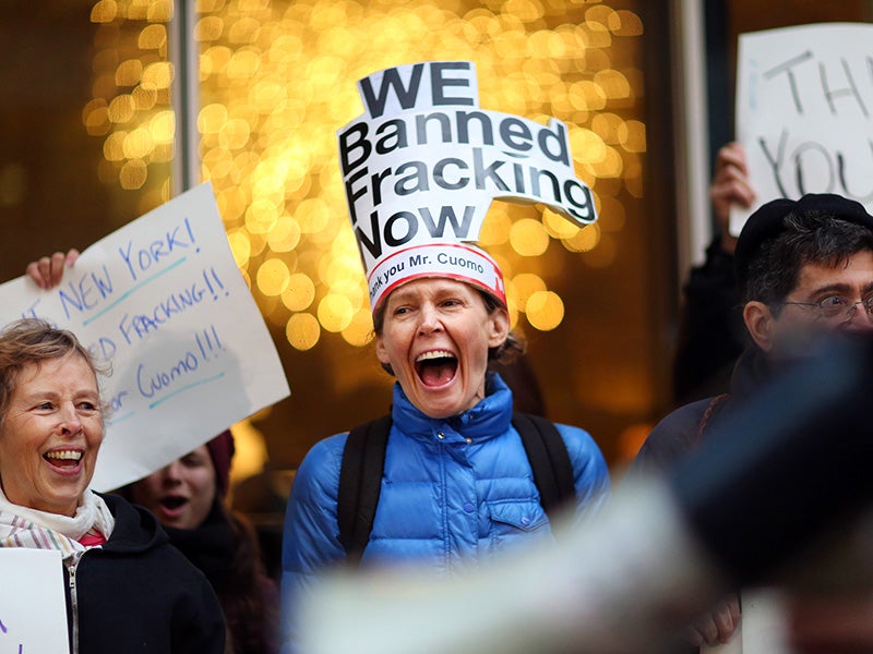 Leslie Roeder, an advocate with New Yorkers Against Fracking, celebrates in 2014 after Govenor Cuomo announced he would ban hydraulic fracking.
(Chang W. Lee/The New York Times/Redux)