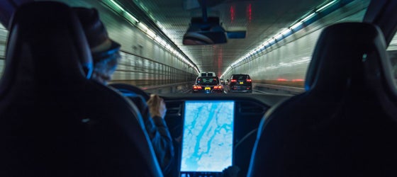 Person driving electric vehicle through Holland Tunnel in NYC. (Getty Images)