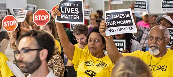 Sharon Lavigne, director of RISE St. James, next to her brother, Milton Cayette, Jr., a St. James resident, at Louisiana’s Department of Environmental Quality’s public hearing on whether to approve the 15 air permits for Formosa Plastics in Vacherie, LA. on Jul. 9, 2019. (Julie Dermansky for Earthjustice)