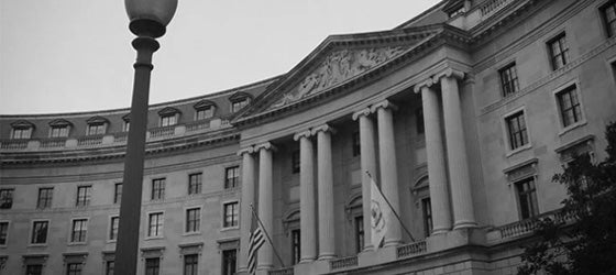 The U.S. EPA’s flag flies outside the Federal Triangle complex in Washington, D.C. (Aidan Wakely Mulroney / CC BY-NC-ND 2.0)