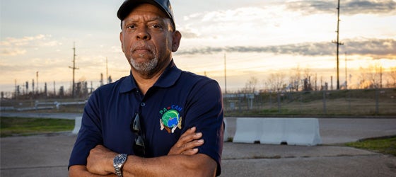 At a playground a block from where John Beard, Jr. grew up in Port Arthur, TX, a petrochemical facility is located across a fence. (Chris Jordan-Bloch / Earthjustice)