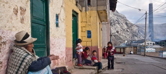 Residents of La Oroya, Peru, photographed in 2008 near the the smelter complex that has made the city one of the most polluted places on earth. (Ernesto Benavides / AFP via Getty)