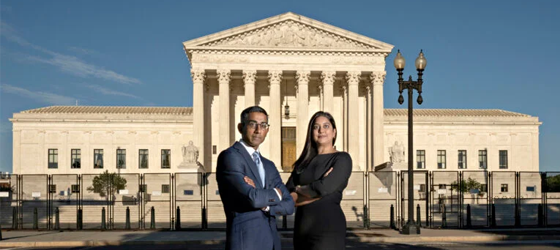 Earthjustice’s Senior Vice President of Programs, Sam Sankar, and Director of Strategic Legal Advocacy, Kirti Datla, pose for a portrait in front of the Supreme Court of the United States. (Melissa Lyttle for Earthjustice)