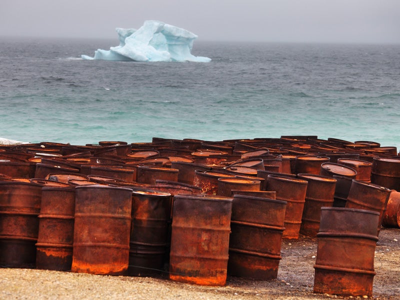 Abandoned oil drums rust on the Arctic coast. There is a 75 percent risk of one or more large oil spills in the Chukchi Sea if these leases are developed.