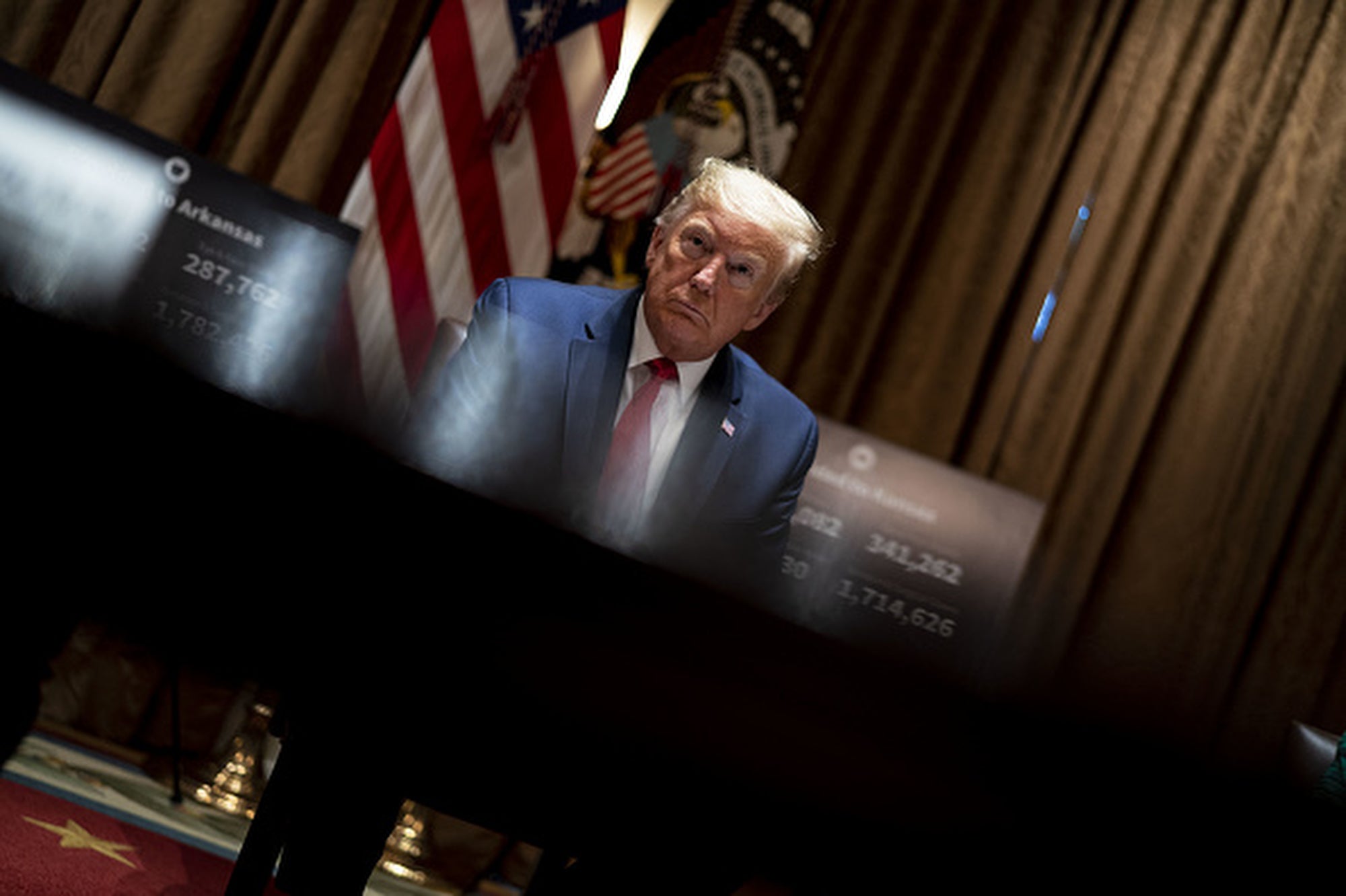 President Donald Trump pauses during a meeting in the White House on Wednesday, May 20, 2020.