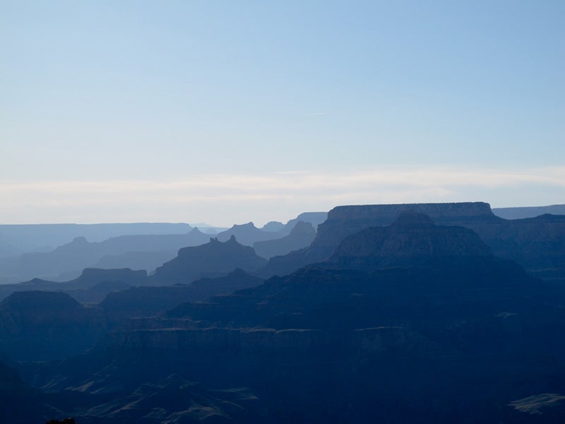 Haze obscures a view of the Grand Canyon.