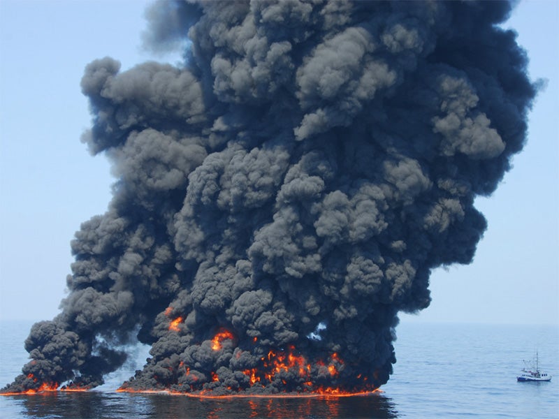 A controlled burn of oil from the Deepwater Horizon / BP oil spill sends towers of fire hundreds of feet into the air over the Gulf of Mexico on June 9, 2010.