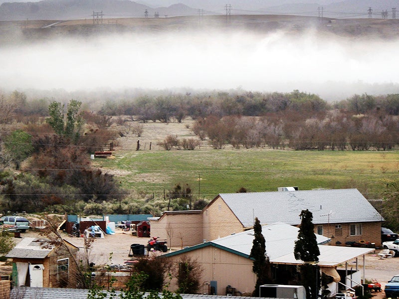 A cloud of toxic coal ash is seen blowing like a sandstorm straight at the homes on the Moapa River Reservation.