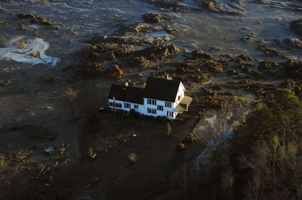 The aftermath of the devastating coal ash spill at the TVA Kingston Fossil Plant near Kingston, Tenn., in 2008. More than 1 billion gallons of toxic coal ash sludge burst from a dam, sweeping away homes and contaminating two rivers. (Dot Griffith/ Appalachian Voice via United Mountain Defense)