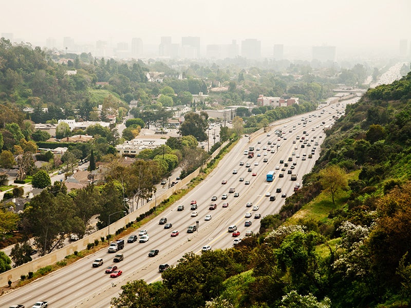 The 405 freeway on a smoggy California day. Heavy-duty trucks are the largest source of smog-forming NOx in California.
(Andi Pantz / Getty Images)