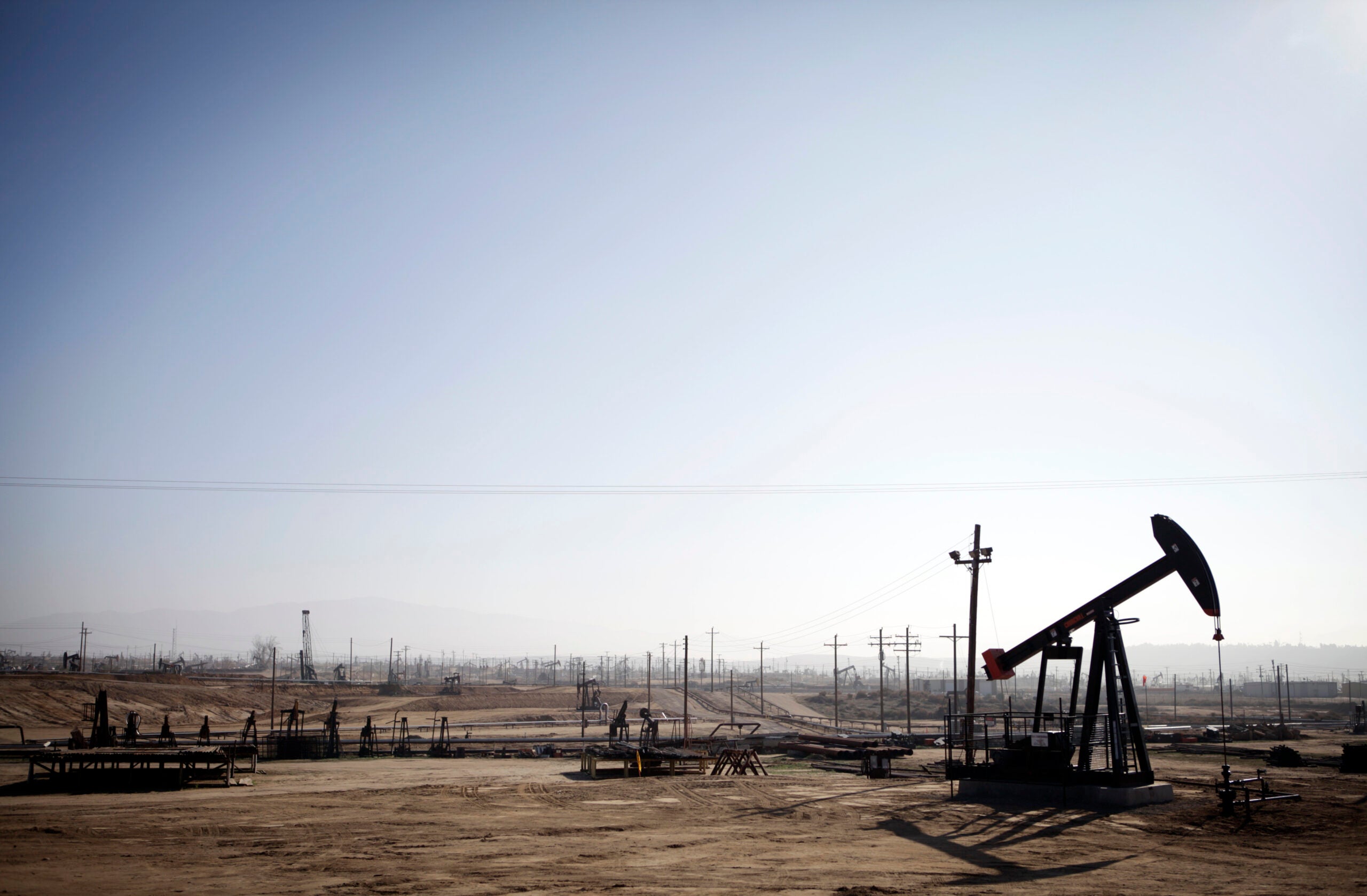 A sea of oil derricks on public lands in Kern County, California