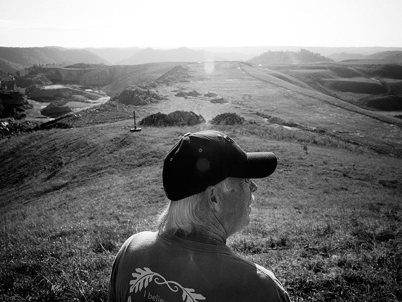 Kayford Mountain in West Virginia has been devastated by mountaintop removal mining. There are now dozens of studies demonstrating that those who live in proximity to mountaintop removal mining operations face higher levels of cancer, birth defects and other health issues.
(Chris Jordan-Bloch / Earthjustice)