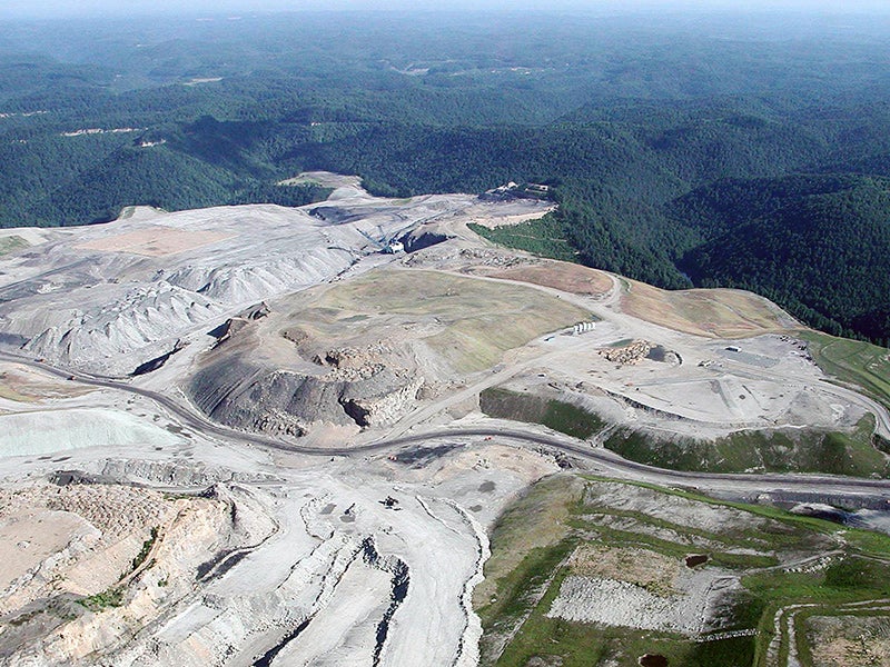 Mountaintop removal is a form of strip mining in which explosives are used to blast off the tops of mountains in order to reach the coal seams that lie underneath.
(Photo courtesy of OVEC)