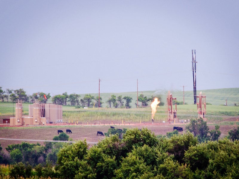 A natural gas flare at a well in McKenzie County, North Dakota. Controlling methane emissions is a critical step toward addressing climate change, and more stringent regulations for the oil and gas industry would be a good start for public lands, taxpayers and the planet.
(Tim Evanson/CC BY-SA 2.0)