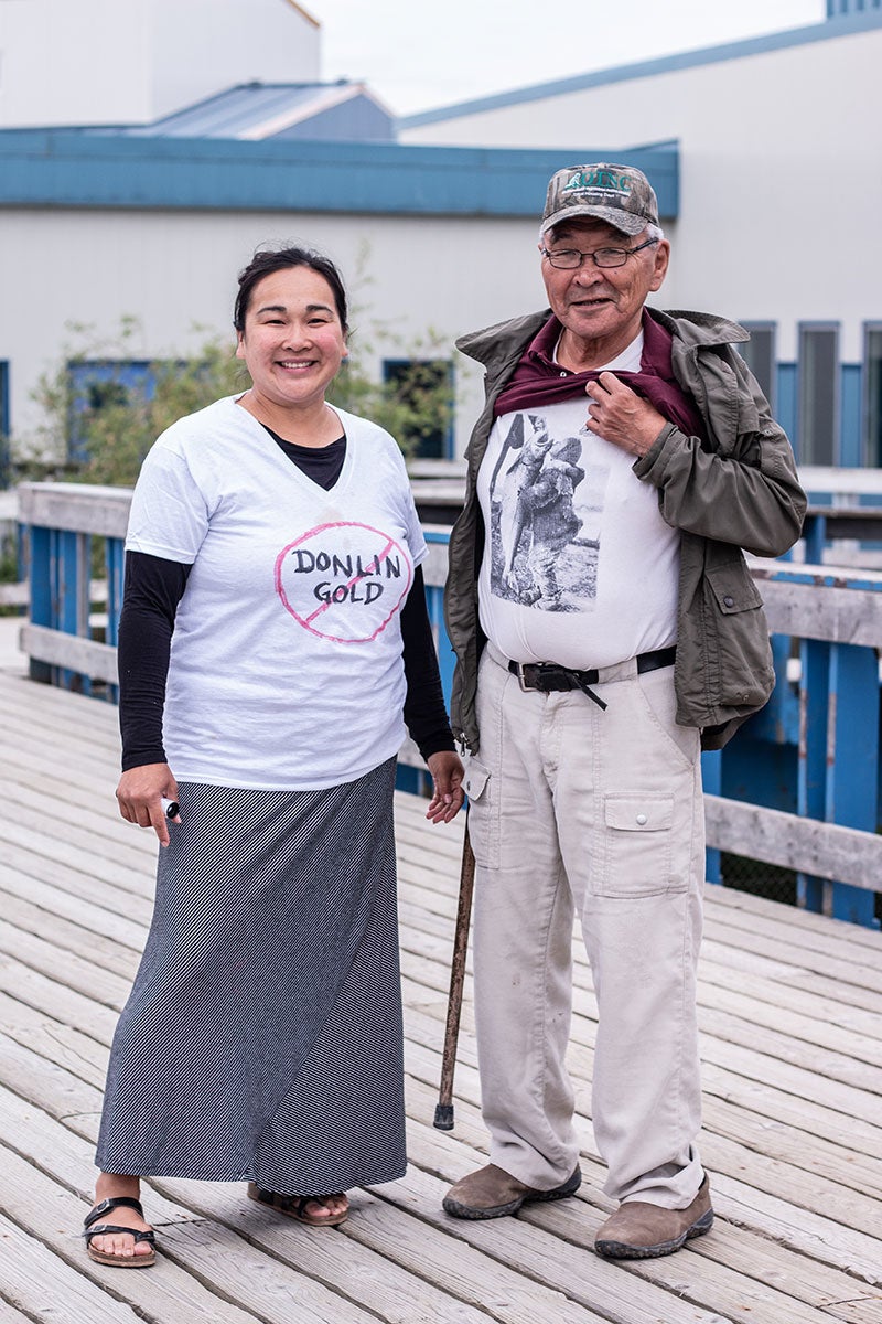 Two residents wear t-shirts proclaiming their opposition to the Donlin Mine at a community rally in Bethel, the central hub of the Yukon-Kuskokwim Delta, July 2018.