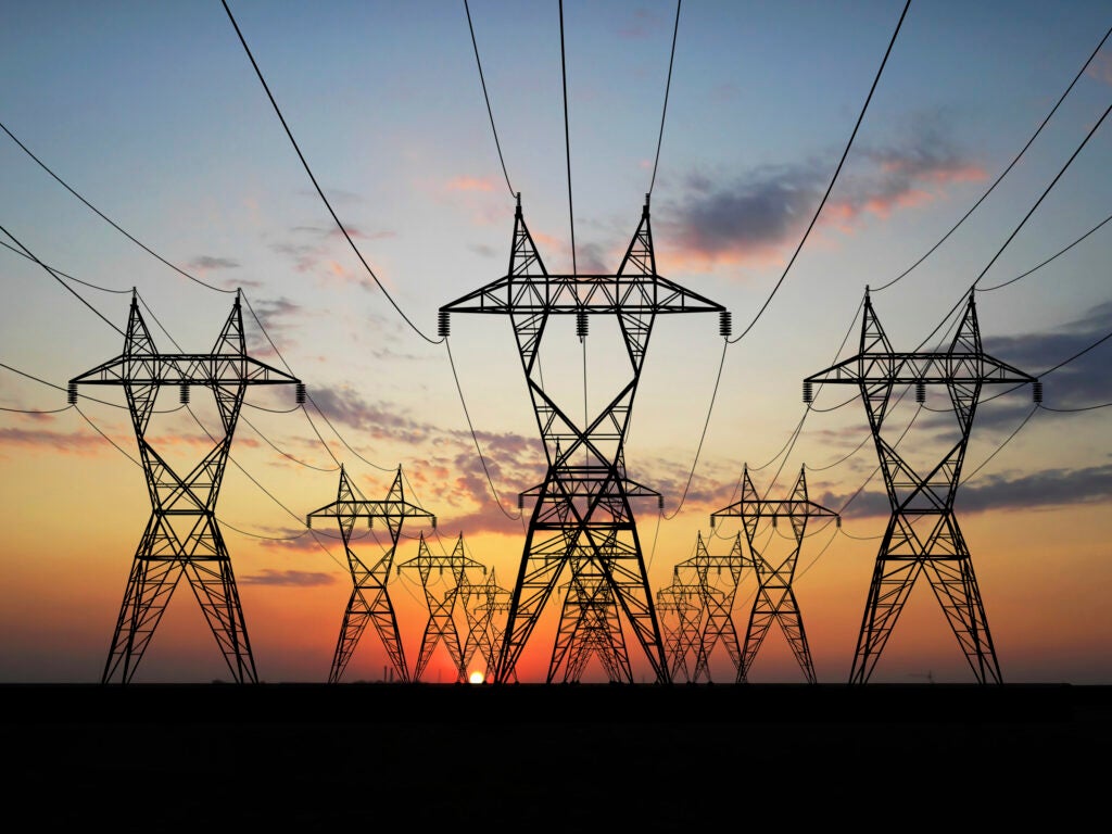 A profile of power supply lines against a sunset.
(istockphoto)