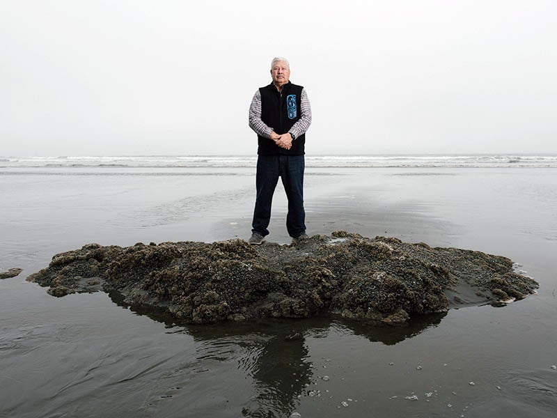Quinault tribal member Larry Ralston stands on the beach at the Quinault Indian Nation reservation. The tribe must relocate the village of Taholah uphill due to sea level rise.
(Kiliii Yuyan for Earthjustice)
