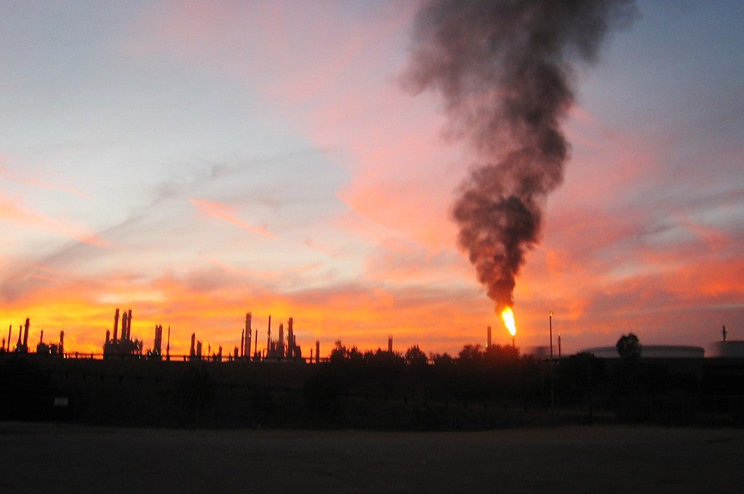 Air pollution emits from a refinery.