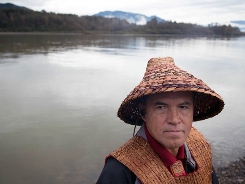 Brian Cladoosby, the elected Chair of the Senate of the Swinomish Indian Tribal Community, during a ceremony at the Fraser River.
(Chris Jordan-Bloch / Earthjustice)