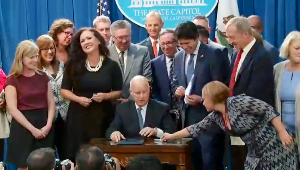 Gov. Brown signs SB 100