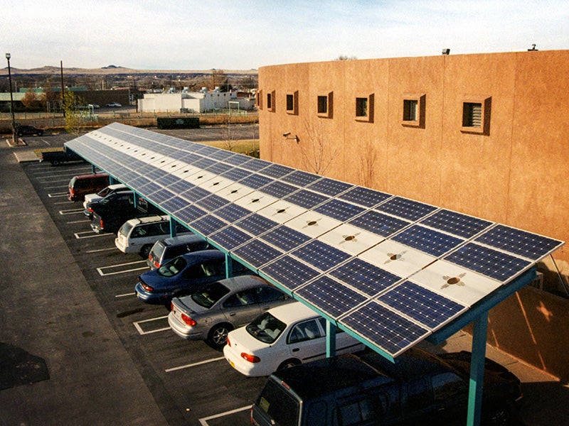 A solar carport at the Indian Pueblo Cultural Center in Albuquerque, New Mexico. The array delivers about 23 megawatt hours of clean electricity annually to the local utility grid.