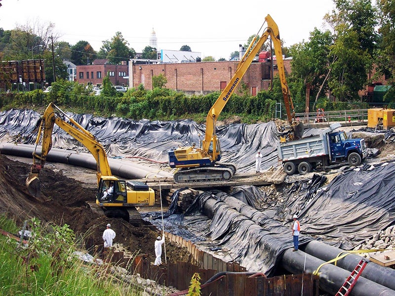 Contractors work on the GE Housatonic Superfund project in Massachusetts.
