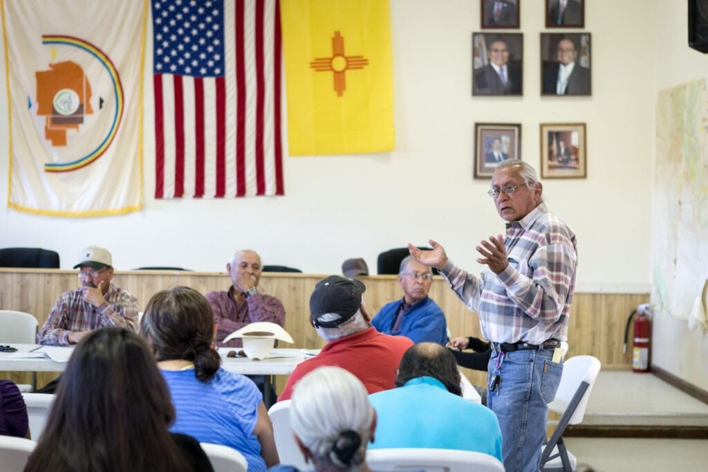 Navajo community leader Daniel Tso speaks at a meeting at the chapter house in Counselor New Mexico where the Bureau of Land Management was hearing public comments on proposed new sites for leasing rights to additional drilling in the San Juan Basin. (Steven St. John for Earthjustice)