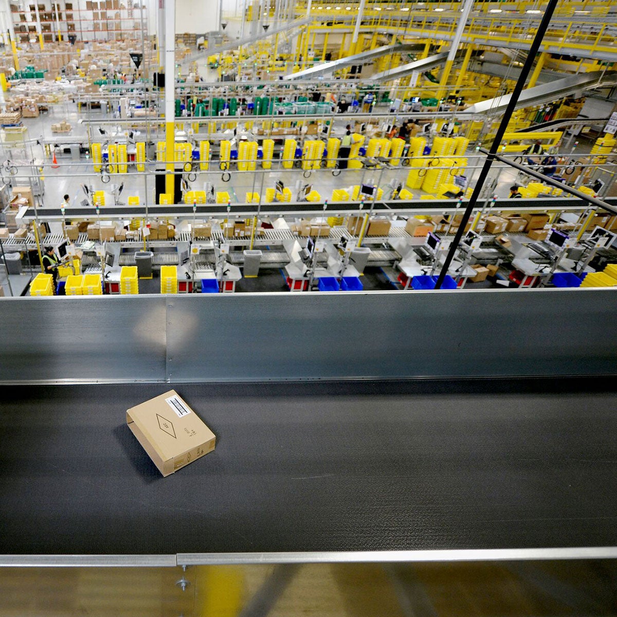 A box travels down a conveyor at Amazon's San Bernardino Fulfillment Center in San Bernardino, Calif. The Inland Empire has become a major hub of massive warehouses.