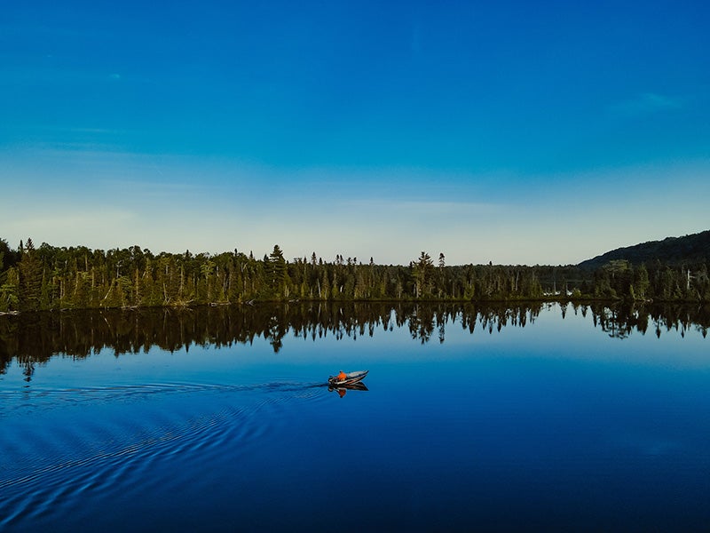 Bob Gravelle, Bay Mills Tribal citizen, fishes on Spectacle Lake in Bay Mills.