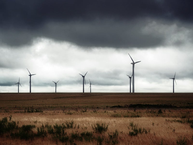 A storm rolls over a Texas wind farm.
