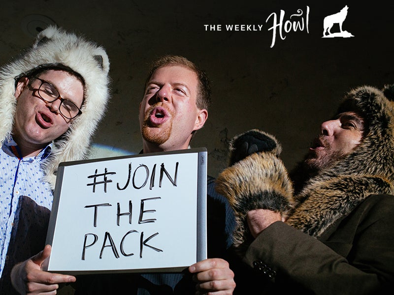 Wolf party attendees howl for the camera as they prepare their #JoinThePack video to honor wolves.