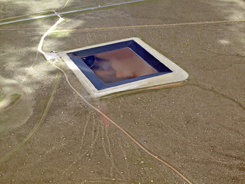 Pavillion, Wyoming. "Produced" water is brought back to the surface after fracking takes place. The water and fracking fluid is placed into evaporation ponds.
(Photo courtesy of Ecoflight)